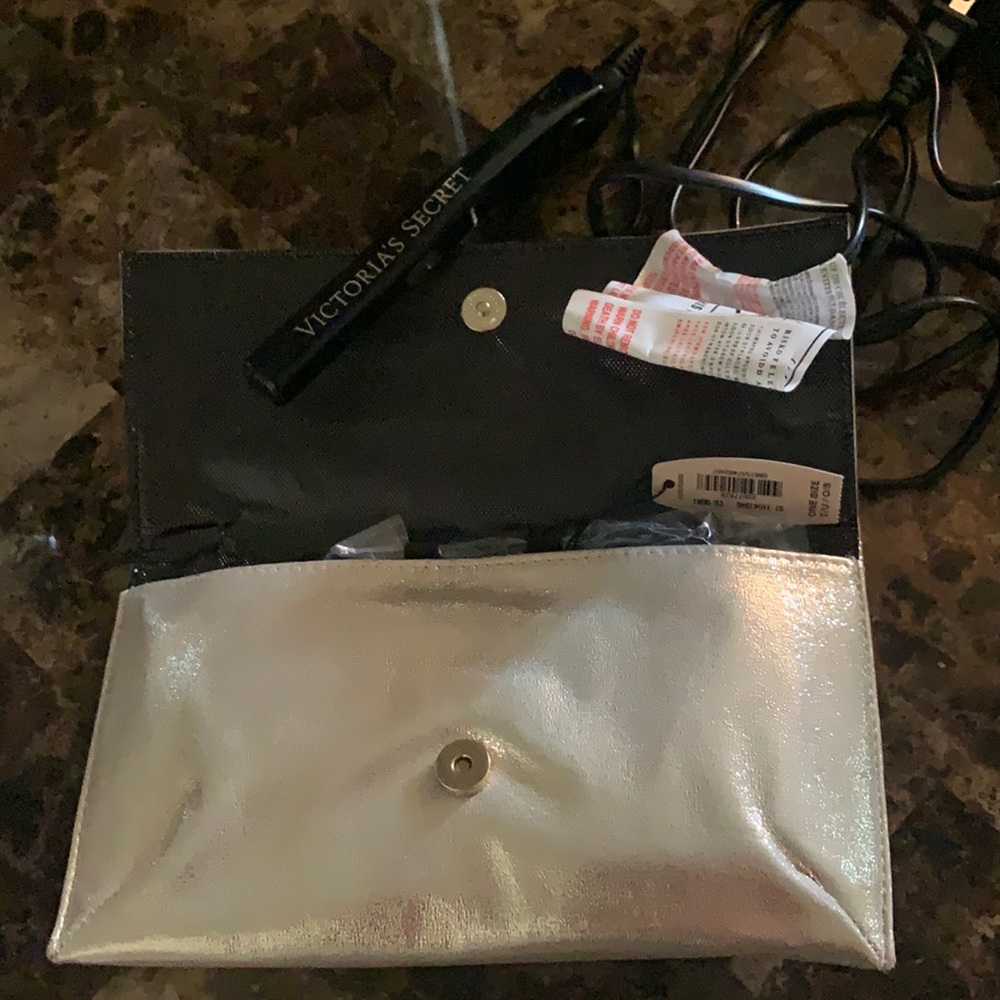 Victoria’s secret travel size hair straightener.